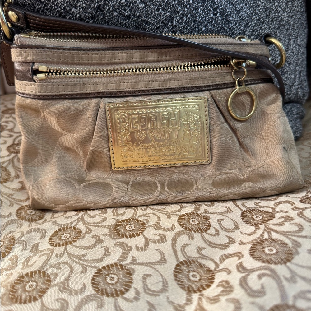 Coach Beige Wristlet with Gold Accents